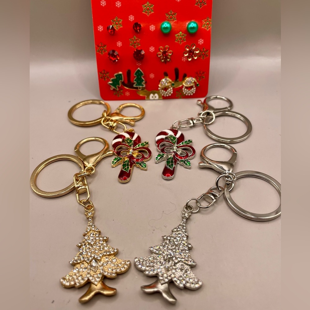 Christmas jewelry set. 2 trees and 2 candy cane key chains & 6 pair of earrings